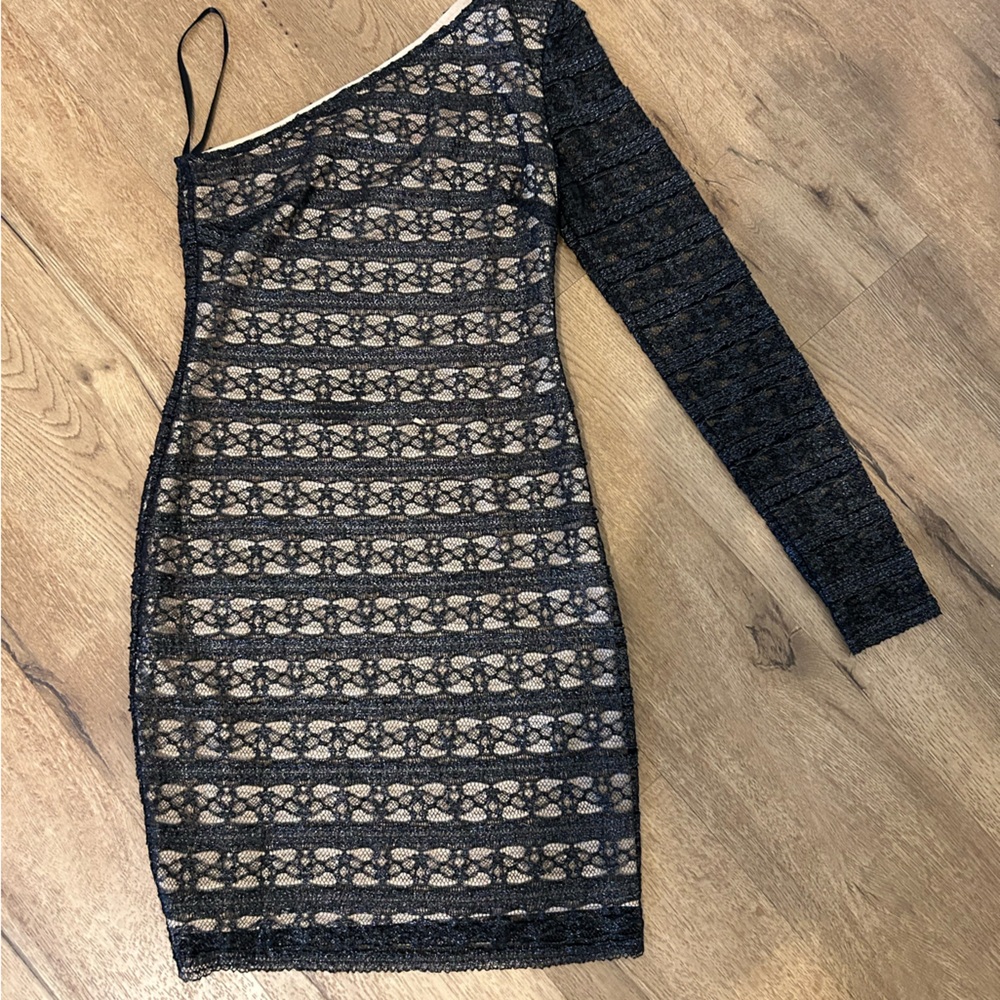 Bebe (Small) single sleeve dress.Sleeve see-through. black mesh w/tan lining.